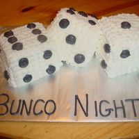 Bunco Night Three white dice cakes with buttercream icing and detail