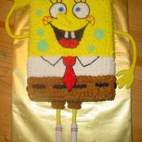 Spongebob Squarepants 9x13 white cake with butercream icing and detail. Arms and legs made of fondant.