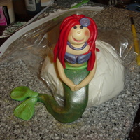 Amanda's Little Mermaid Cake Toppers My version of Ariel and Flounder from Little Mermaid. This will be going on a Little Mermaid cake that I am working on. Hand molded from...