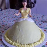 Yellow Doll Cake Coffe cake, decorated with white and yellow fondant