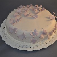 Purple Butterfly This is a truffle cake, covered with sugar paste and purple butterly