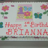 Hugs And Stitches Cake Pink Velvet with cream cheese filling and buttercream icing. Edible image and fondant flowers and butterflies.