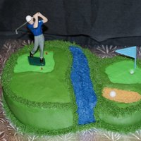 Golfer Cake Golf Cake - This cake was for my husband on his birthday! It is an eight inch chocolate round double layer cake with a 6 inch round single...