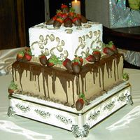 Grooms Cake Chocolate cake, chocolate drizzle and chocolate dipped strawberry's. This gooms cake was a big hit!