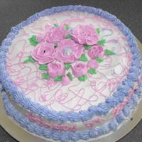 9 Yr Old Girl Birthday Cake Made for a 9 yr old girl ... 10" round Marble with double chocolate ganache filling . First time making RI flowers .. TFL