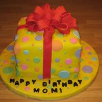 Present I made this cake for my mom's birthday. This was my first attempt at using an airbrush to color the fondant.