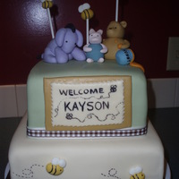 Classic Pooh Baby Shower My first paid cake! Woo-hoo! This is a WASC with buttercream, covered in handmade MMF. Accents MMF/GP. Also made 2 dozen cupcakes, half...