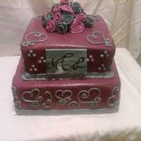 My First Wedding Cake This was my first wedding cake. It was difficult for me and gave me a hard time because it was hot and humid out and the fondant wasn'...