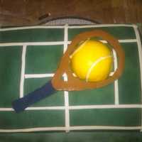 Xavier's Tennis Party Plain FV cake, CHocolate mousse filling, Airbrushed green fondant, White fondant cutouts, raquet is Chocolate - free hand and ball is one...
