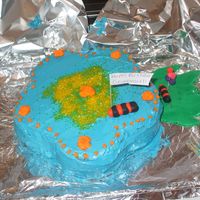 Birthday Cake For My Grandmother Buttercream frosting, edible glitter for the center, fondant leaf, caterpillars, and balloons