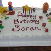 Super Mario Cake Thrown together last minute for our friends son, everything but the Mario, Donkey Kong, and Yoshi are made out of gumpaste. Cake is from...