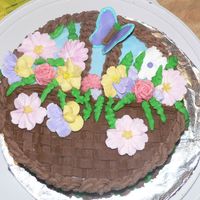 Basket Weave Cake Wilton class II basket weave cake with royal flowers. Chocolate buttercream basket and blue buttercream base.