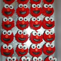 Elmo Cupcakes I made these Elmo cupcakes for a little girl's birthday party. I also made a coordinating Elmo mini cake especially for the birthday...