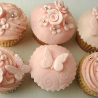 Pink Flower And Butterfly Cupcakes These are a collection of cupcakes that I made for my sister-in-law's birthday. They are strawberry cupcakes with strawberry...