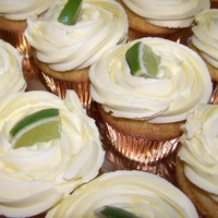 Margarita Cupcakes With Lemon Frosting Followed the Margarita Cupcake recipe here, and then added some fresh lemon juice to Buttercream icing then topped with lime accent.