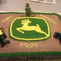 John Deere Tractor I did this for my mom's 60th birthday. She absolutely loves tractors. In addition to the John Deere logo, I placed some of her tractor...