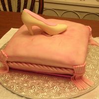 Shoe On A Pretty Pillow This was as hard as it looks. This cake was for someone who loves shoes. Her sister wanted a shoe on a pillow. It was inspired by the cake...