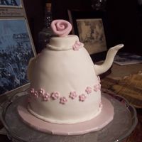 Teapot Cake Pink Flowers I made four of these teapots (2 w/pink flowers, 2 w/peach flowers). The pink ones are french vanilla cake w/buttercream filling, satin ice...