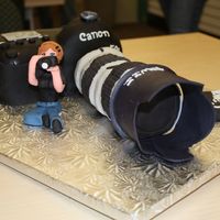 Photog Cake!!! I made this for the Wilton 4 Class..... I took it to my friend who is a photographer!! The figure is her!! I love how it turned out!!...