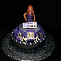 America's Next Top Model ANTM Cake for Wilton Course 4 class.... Tyra Banks is fondant over styrofoam..... pictures framed with fondant, fondant ball border,...