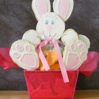 Bunny Basket A bunny Easter cookie bouquet, made with NFSCookies. "Carrots" in a bag for the tummy.