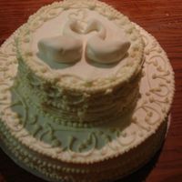 Swan Wedding Cake This was a surprise wedding cake for a bride and groom who weren't going to be able to afford one. The cake is a 2-layer round pound...