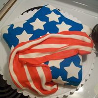 Star Flag This is my version of a cake that I have always wanted to do from Wilton.com. It is a yellow cake, baked in Wilton's star pan, covered...