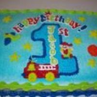 1 St Birthday This was a fun cake to make its all butter cream icing and it matches the plates and party theme supplies you can get at birthday party...