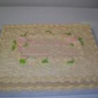 Cream And Lite Pink This is a all butter cream cake that is 1/2 sheet and it has corneal lace and lite pink roses
