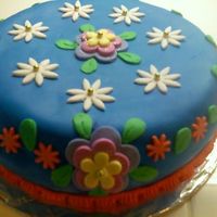 First Fondant This is the first fondant work I have ever done. I went for bright colors just so I could see how it would all come out and I figured it...