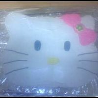 Hello Kitty This cake took me 6 hours to make!! I made it for my Goddaughter's birthday. It is a total of 4 cakes! The inside of it is bright pink...