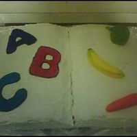 Abc This one is the first one I did in an actual cake decorating class. She was showing us how to make the fruits out of fondant.