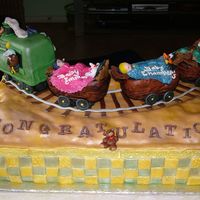 Looney Tunes And Scooby Welcome Baby Train All Aboard!! Welcome 3 babies to the world. Celebrate with 3 families as they pull into delivery day. Full sheet covered with MMF with...