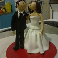 Bride And Groom this is my first attempt to make these. they came out pretty well. made it will the clay that you bake in the oven. had a little accident...