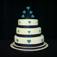 Wedding Cake this i made for my friends wedding. she placed the hearts on the cake the way she wanted them. the heats where all meant to go on the top...