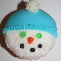 Snow Man Cupcake made for my daughter's 2nd grade class.