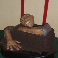 Zombie Cake MMF/rice krispie treat zombie on top of a 12 x 18 cake. cake was covered in BC and oreo crumbs