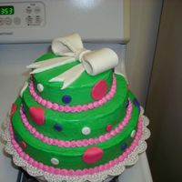 L_A6D497C768B8C2F3B5C5Bbbdd7Df.jpg Buttercream with Fondant accents and fondant bow.