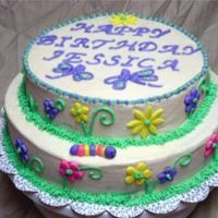 Garden Birthday Cake Buttercream w/ fondant accents. Still trying to get my buttercream to look smooth.