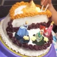 Princesses This was made for my friend's daughter's 2nd b-day.. It was my first stage cake. I'm a newbie. BC icing.