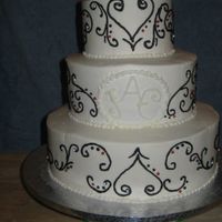 Black Swirls On White Cake This was my 3rd wedding cake and it was a fairly scary one. She wanted a white cake with black swirls and at first it sounded easy and I...