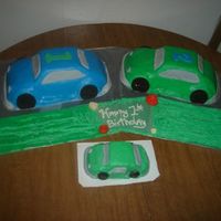 1St Birthday I did these cakes for my youngest sons 1st birthday. We had two peices of cake left over. His little cake is in the front.