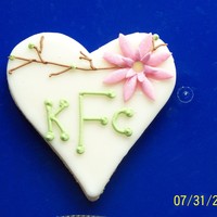 Monogram Bridal Shower Cookie NFSC with icing and royal icing writing and twigs. Flower is gumpaste. Tweaked an idea I saw on CC.