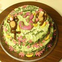 Monkey Birthday Cake This was for 2 cousins turning 3. I used whipped frosting for the cake and the vines. All other deco was with the buttercream fondant. It...