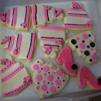 Cake And Shoe Cookies sugar cookies iced in white or pink with fondant deco, they were brushed with luster dust for a pretty sparkle, but you can't see it...