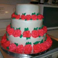 Maila & Paul's Wedding Cake This is made of 10, 8, & 6 inch fondant covered tiers with buttercream decorations. The cake was french vanilla with a mocha filling -...