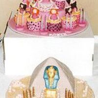 Twins Birthday Cake. I have twin grandchildren a boy and girl they created the idea for these cakes one each.The pyrimid was quite hard to shape but my grandson...