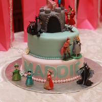 Sleeping Beauty Cake 2 tier, 10" and 8" with a 4" castle (so I guess it was 3 tier)! The client supplied the figurines and put them on the cake....