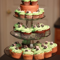 Baby Shower Cupcakes Ladybugs and flowers are fondant. The flower pot on the top tier is cake as well, covered in fondant.