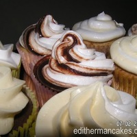 Vanilla Cupcakes With European Butter Cream Icing And Ganache this was an experiment to see if people like this kind of icing on cupcakes at my work...they did...:)